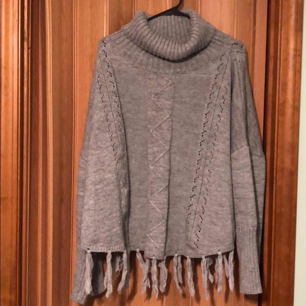 Fringy turtle neck sweater